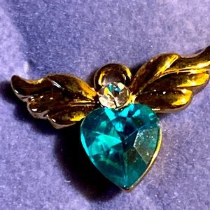 Vintage AVON pin, tiny angel birthstone pin December/simulated blue topaz